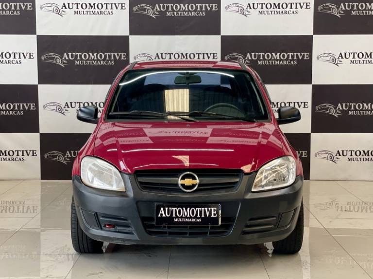 CHEVROLET - CELTA - 2010/2011 - Vermelha - R$ 19.900,00